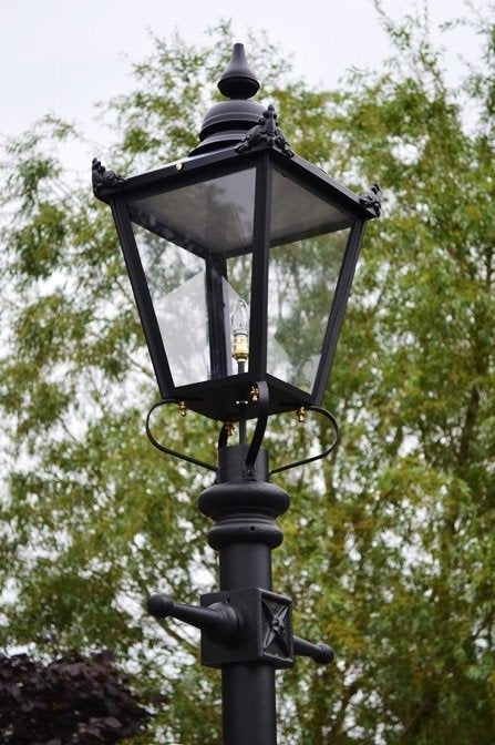 extra large lamp post in black in car park