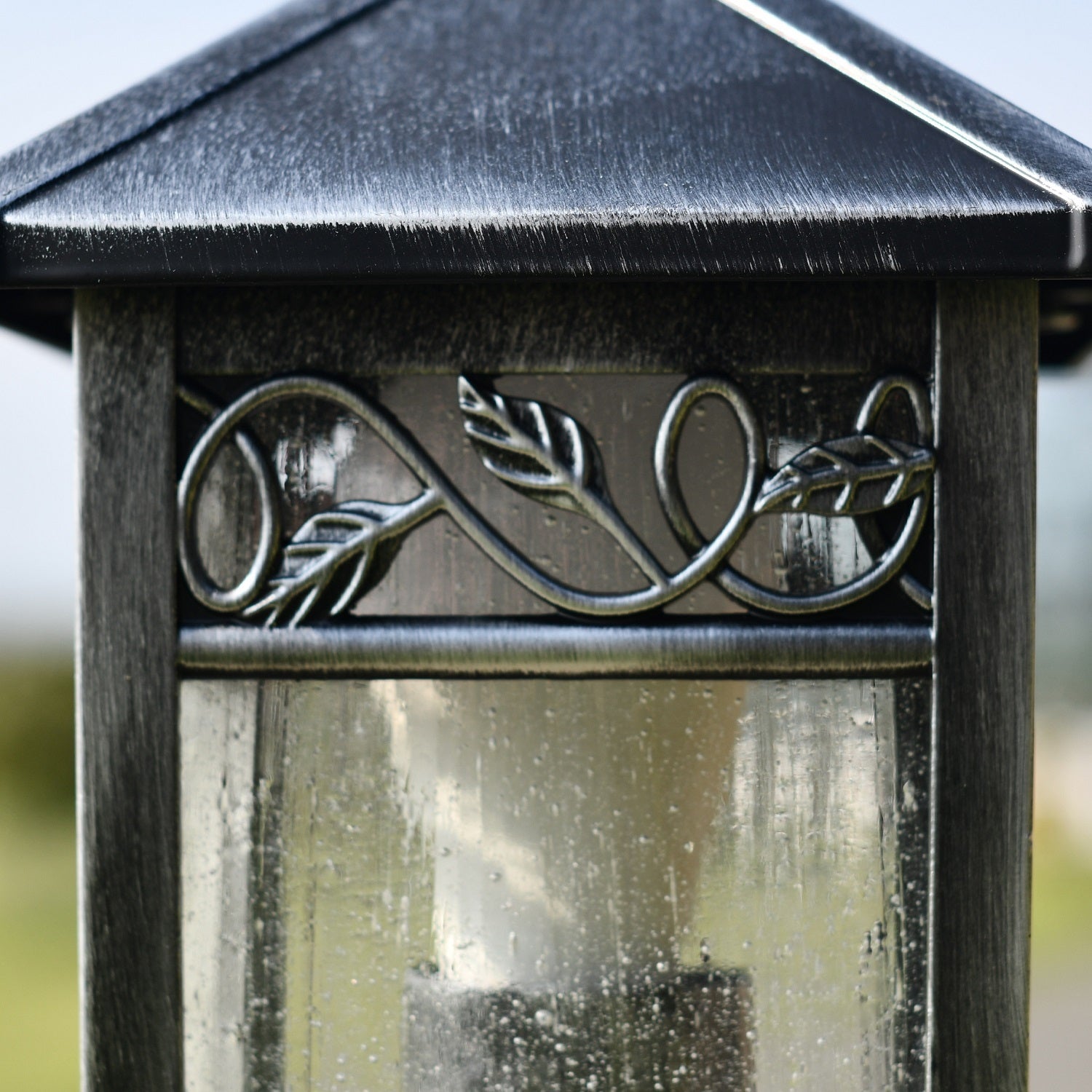 Floral detail on pillar lantern