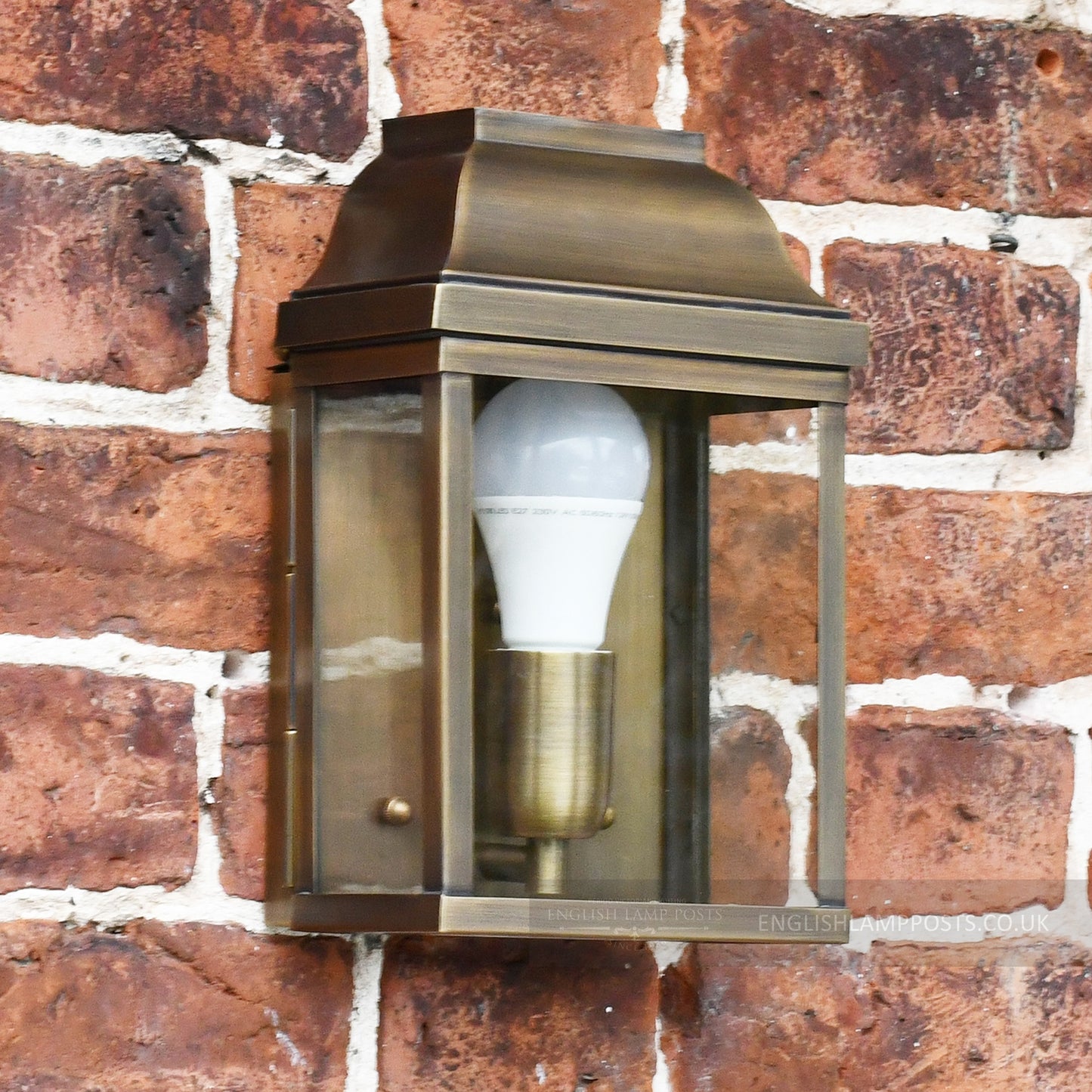 Flush Antique Brass wall lantern