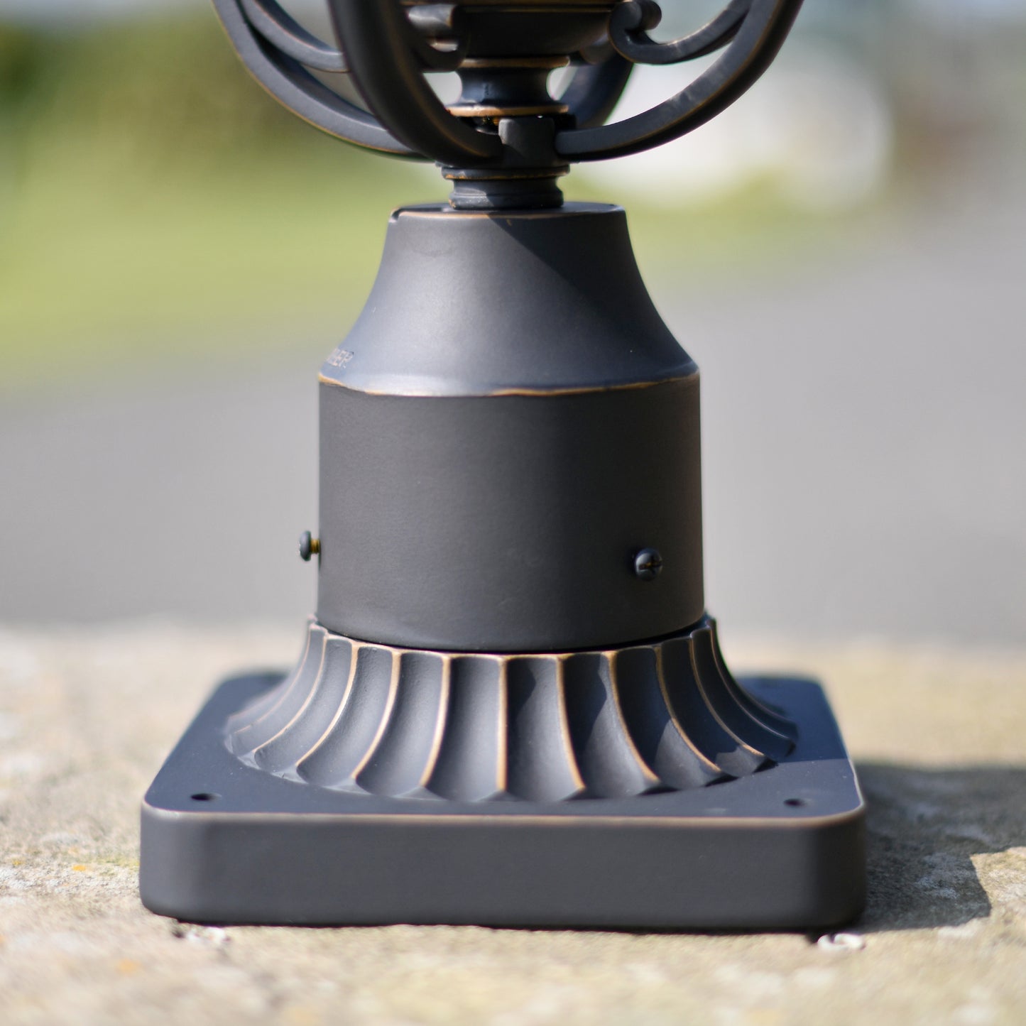 Fluted antique base on pillar light