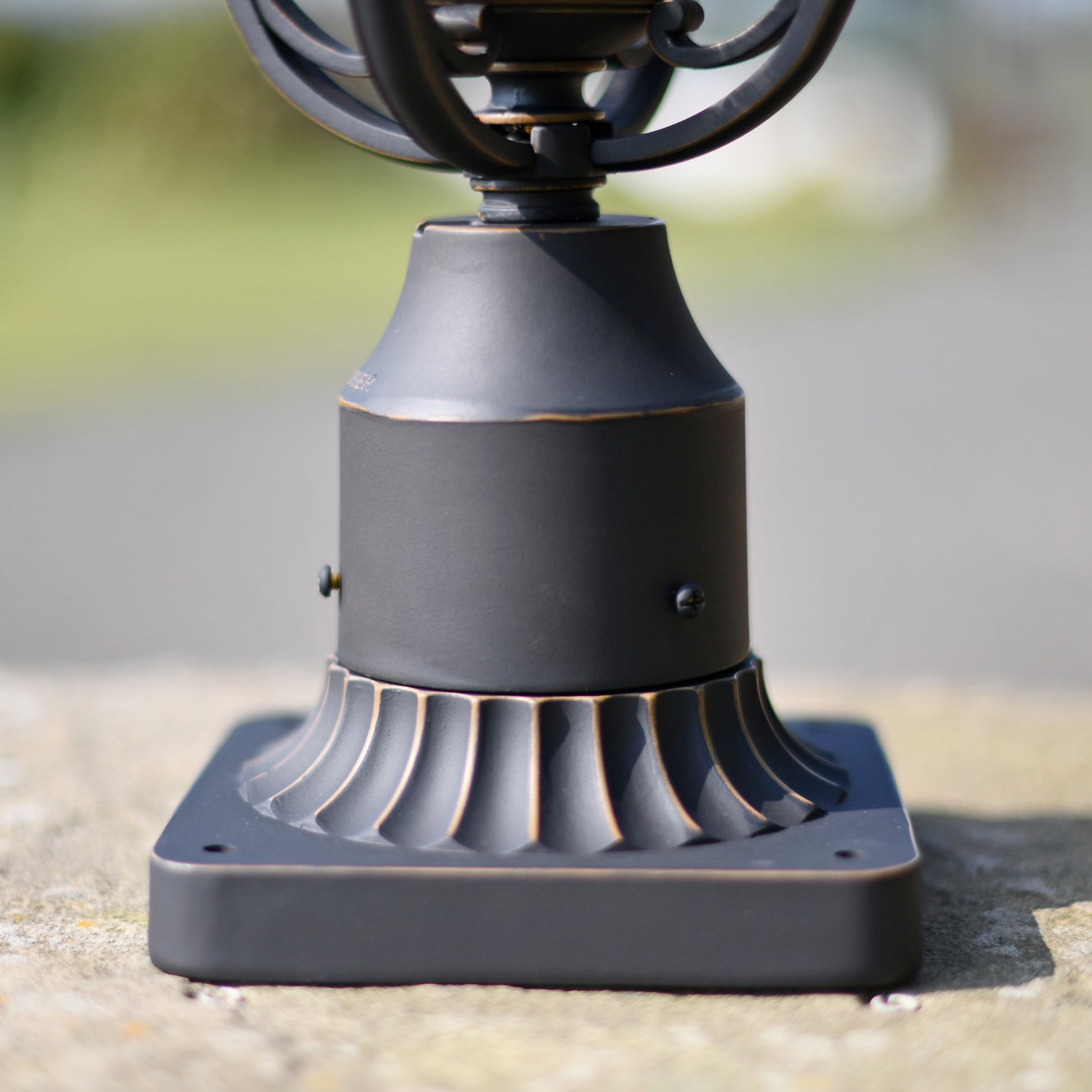 Fluted antique base on pillar light