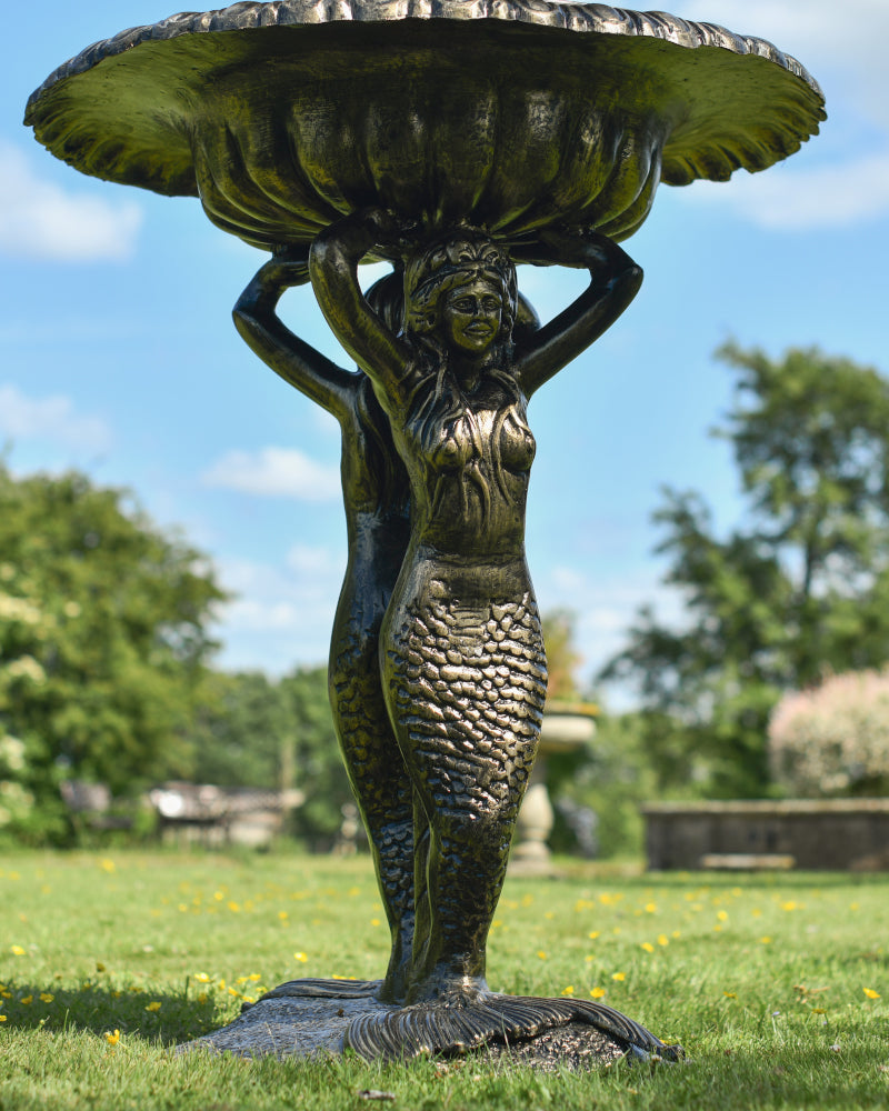 Close up of the mermaid sculpture at the base