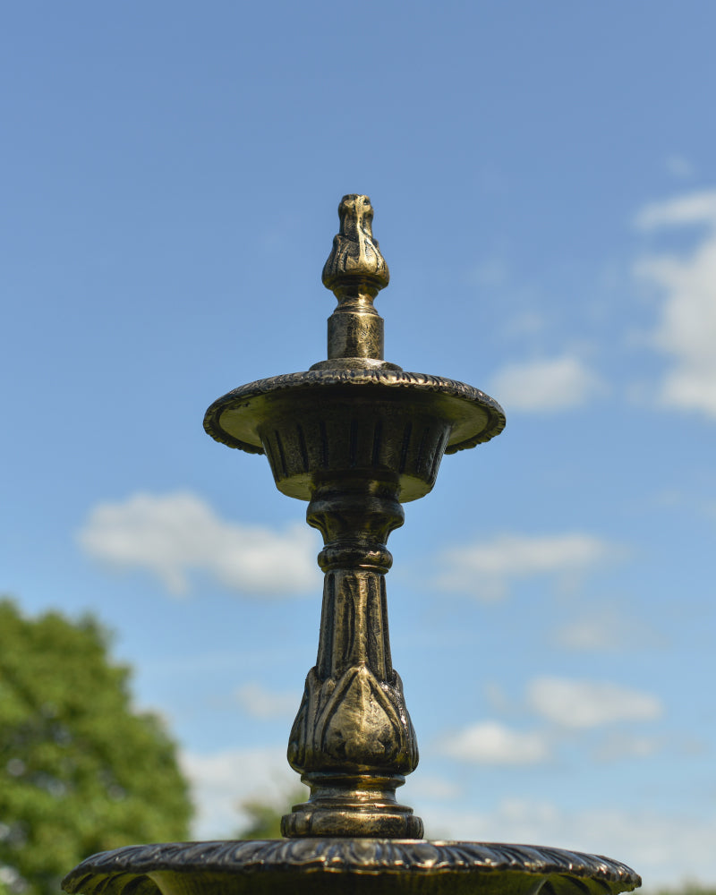 Magnified view of the ornate water fountain apex