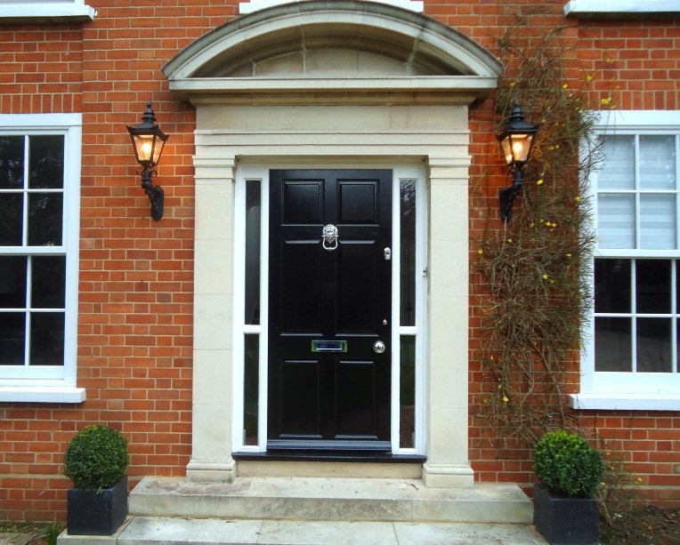 Front View Georgian House Lanterns either side of the door
