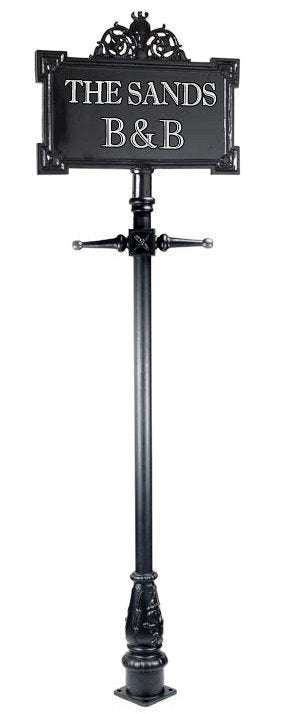Full size sign post  with sign writing