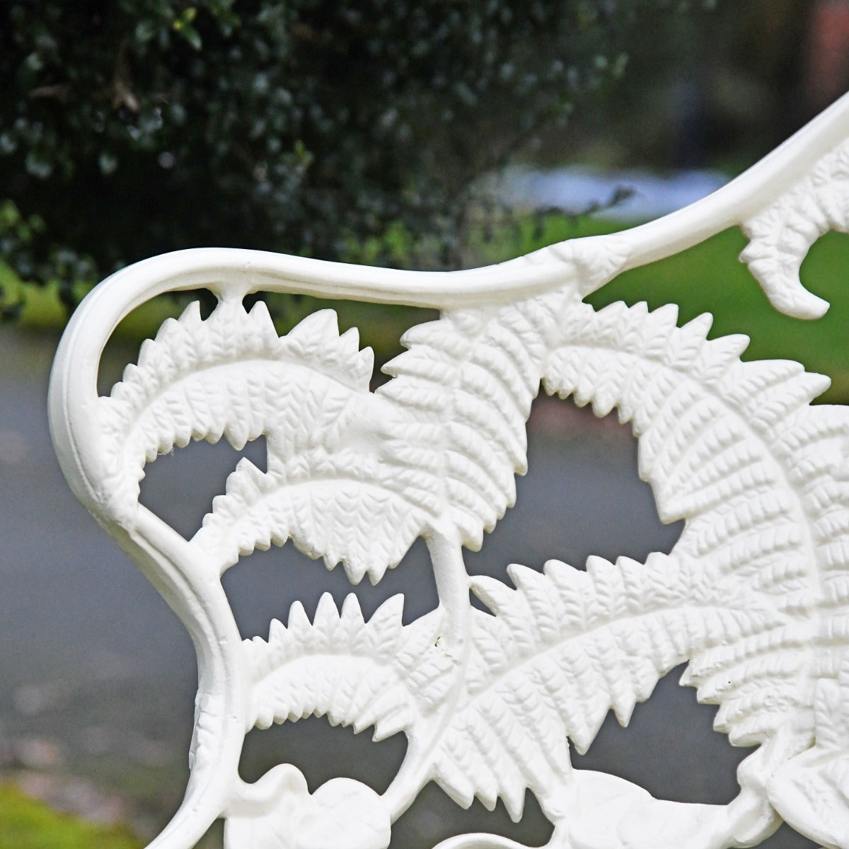 Close up of garden bench design in cream finish 