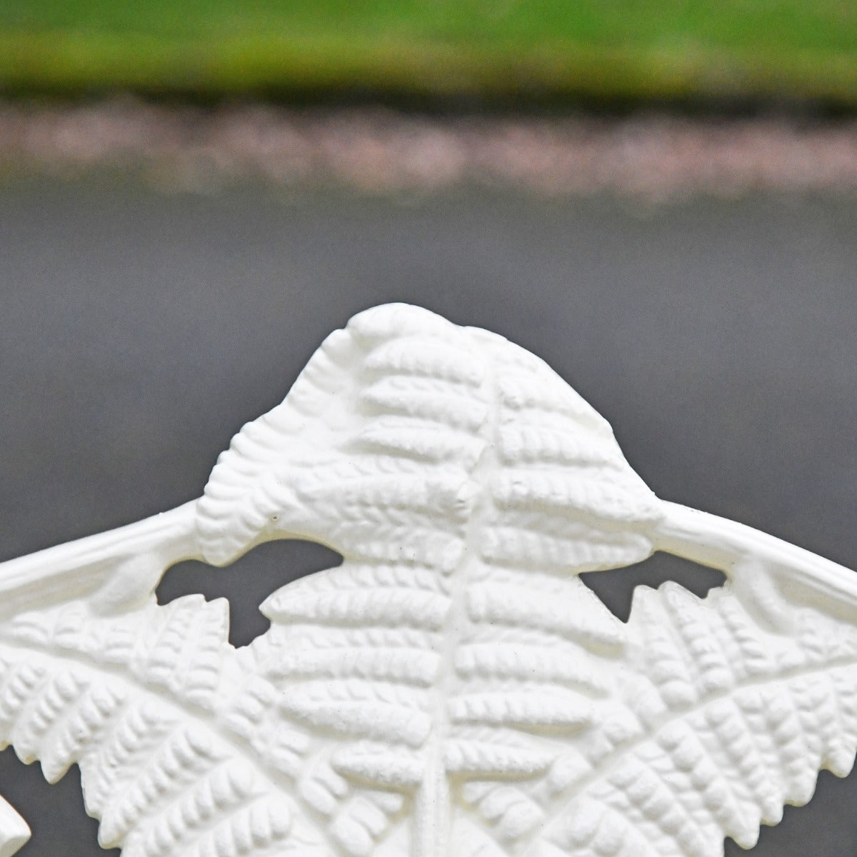 Close up of cream finish on garden bench 