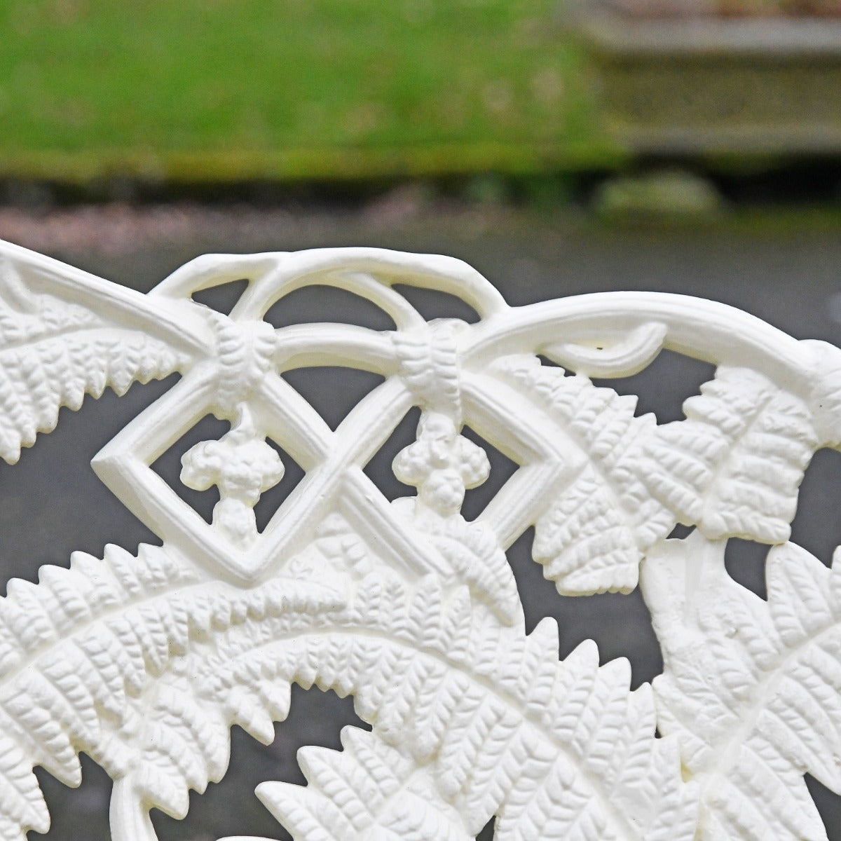 Close up of cream finish on Rochester Garden Bench 