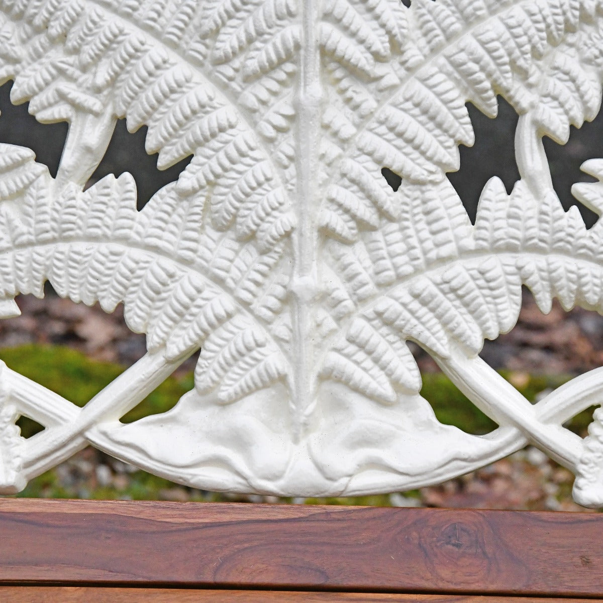 Close up of fern detailing on bench backrest 