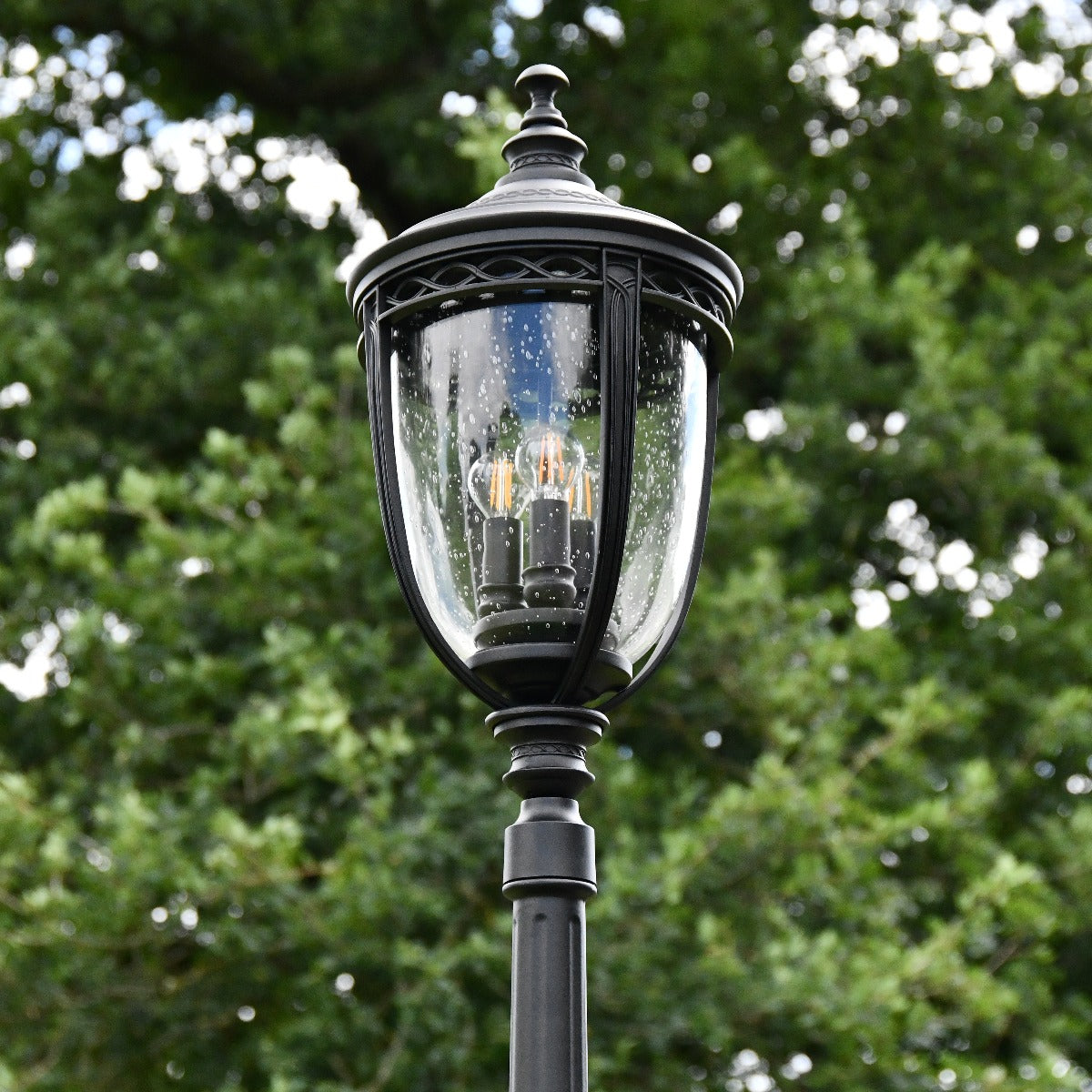 Glass Dome Lantern On Black Column