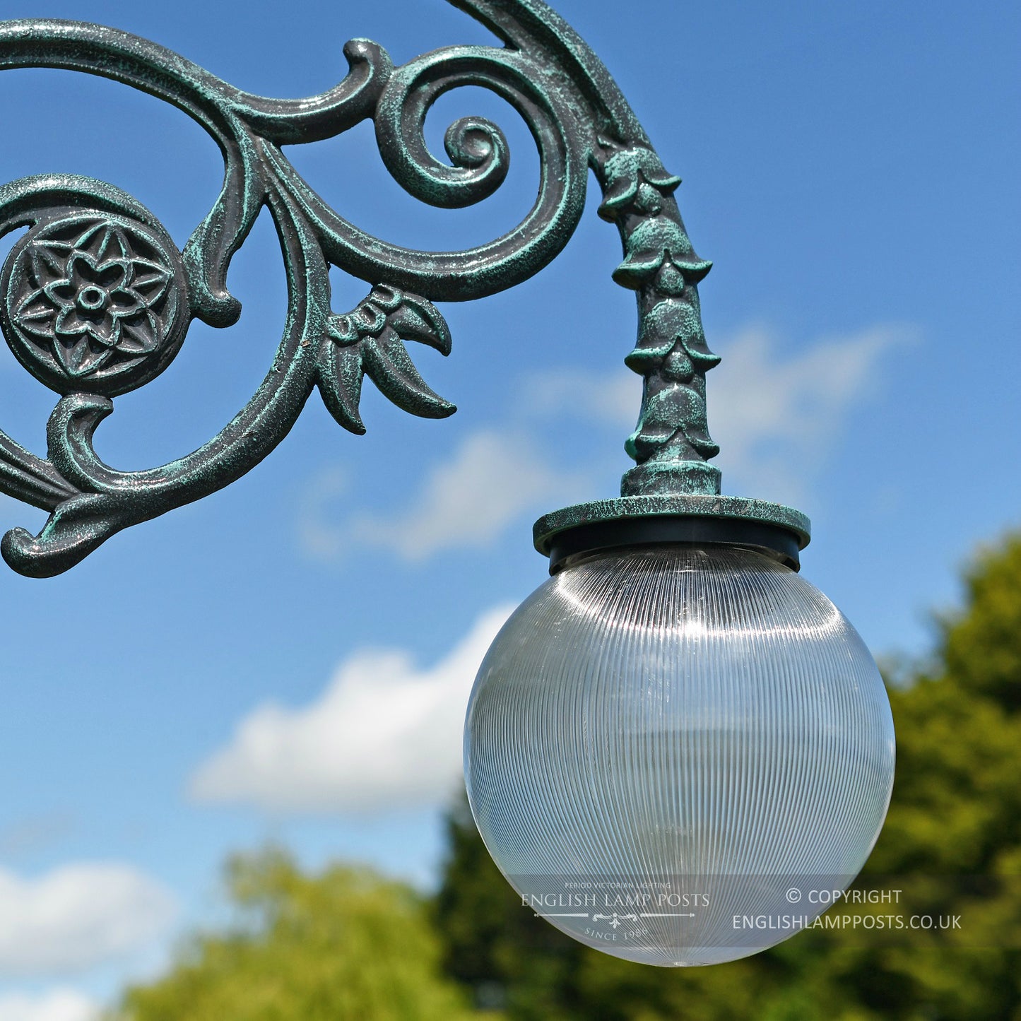 Glass Globe Luminaire On Antique Blue Lamp Post Bracket