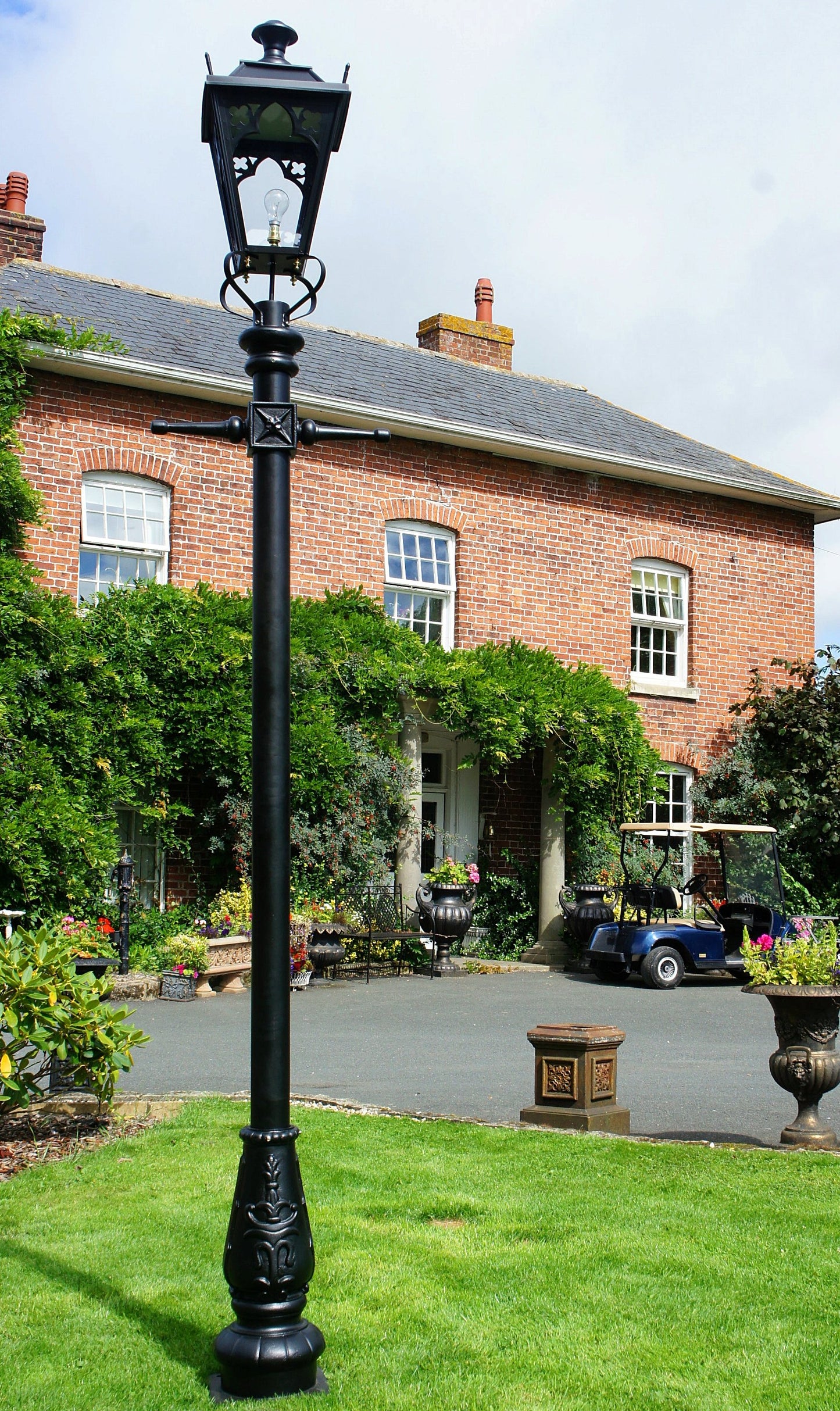 Gothic feature lamp post in front garden