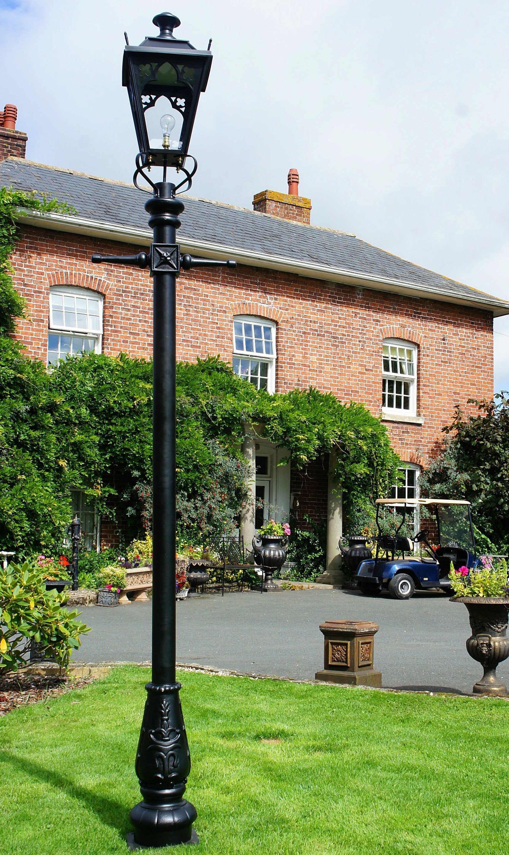Gothic feature lamp post in front garden