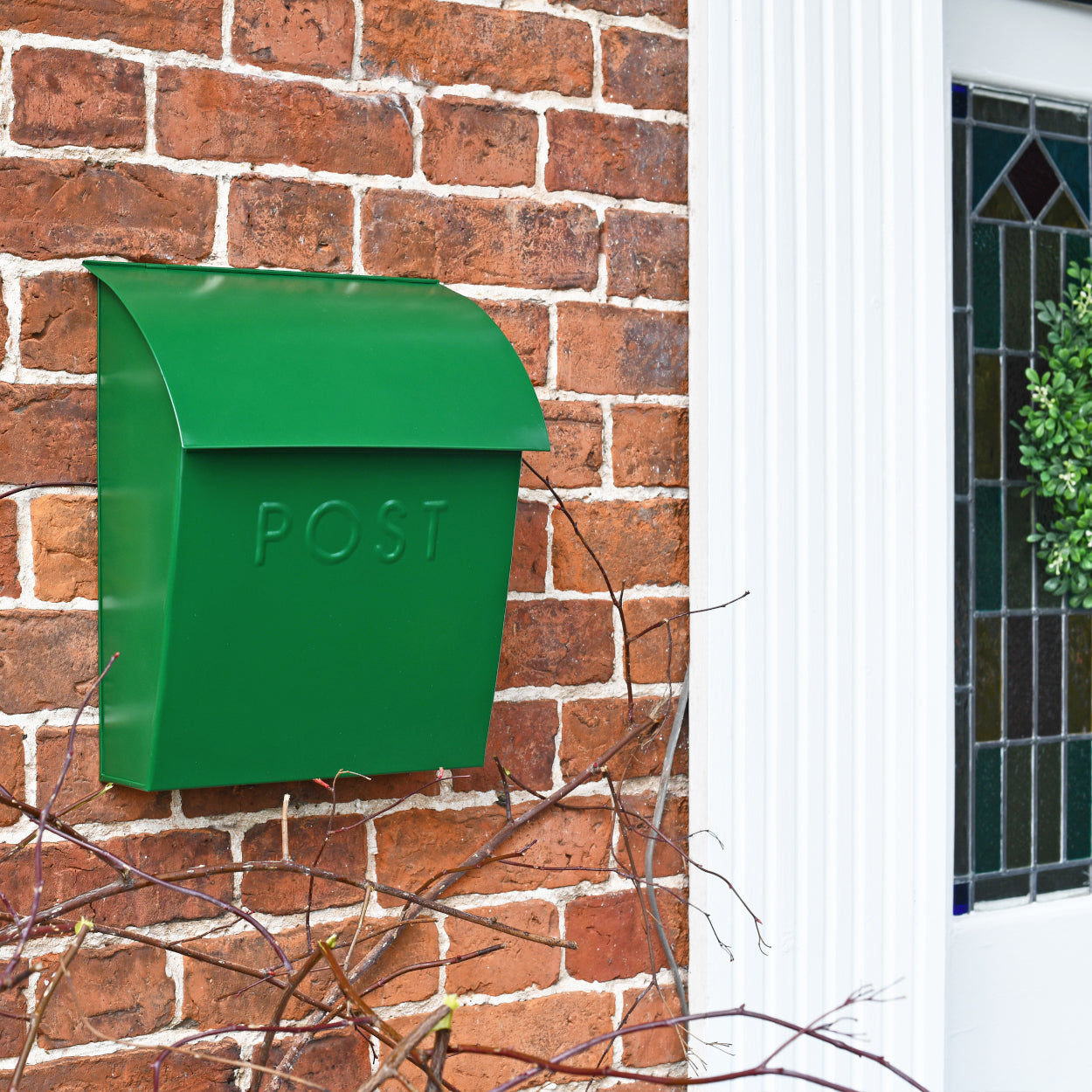 The lockable post box in situ