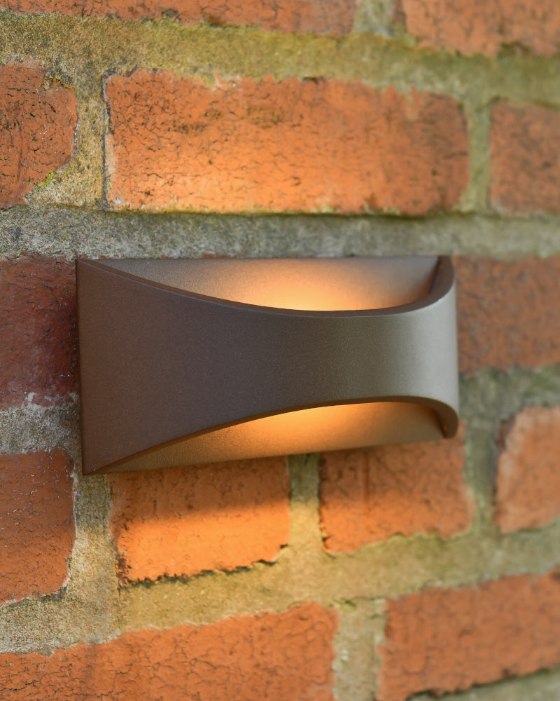Angled view of the LED wall light lit up