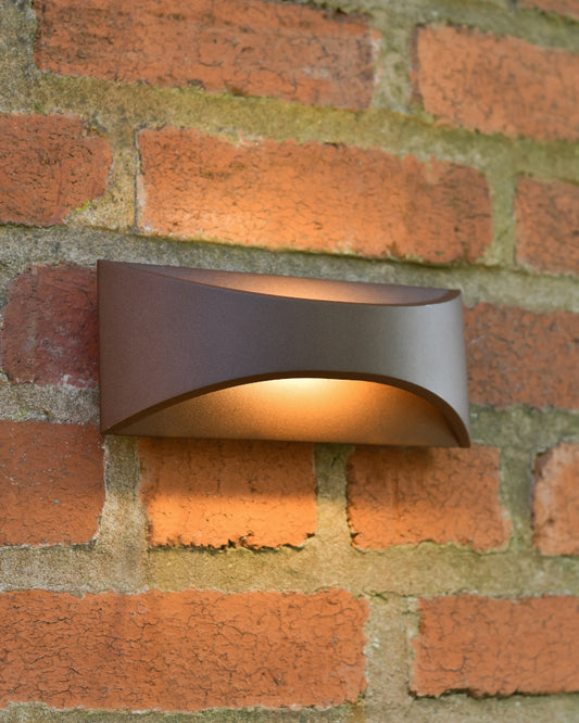 The 'Haddon' wall light illuminated 