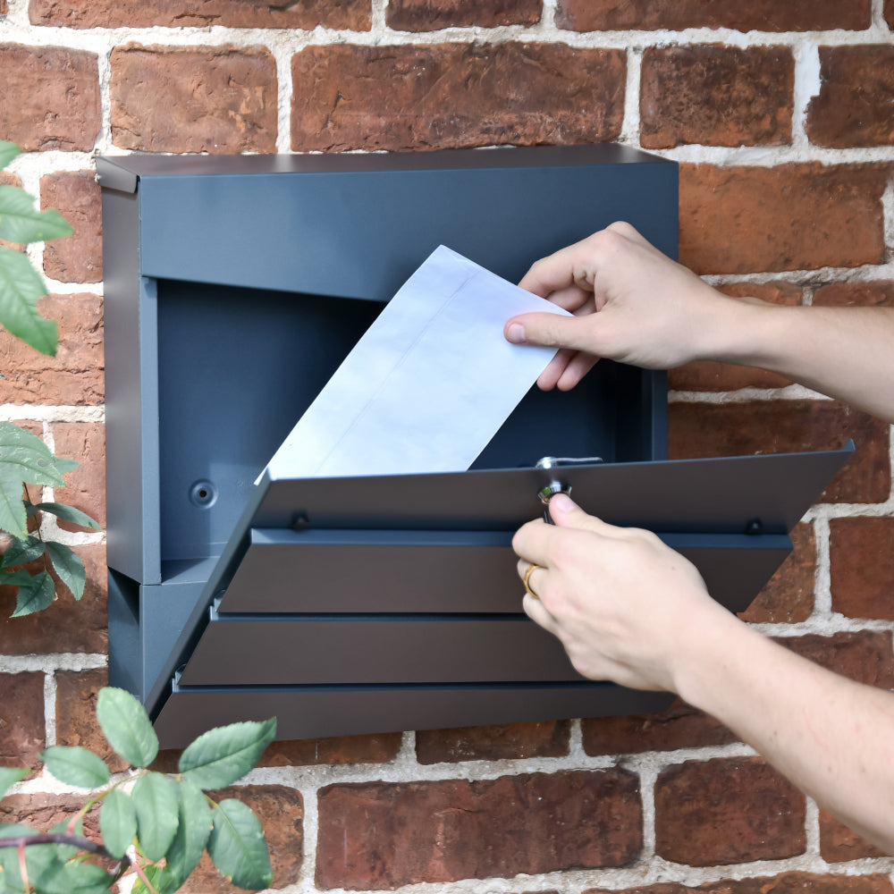 The 'Haines' post box being opened