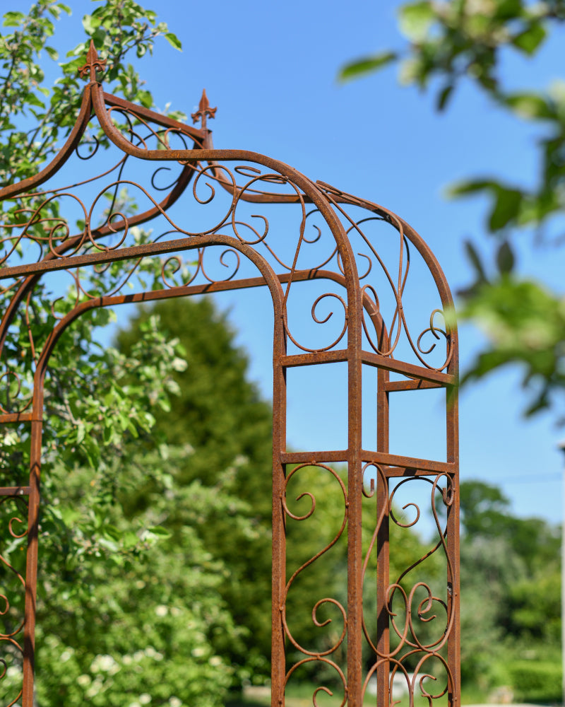 Angled view of the rustic rose arch