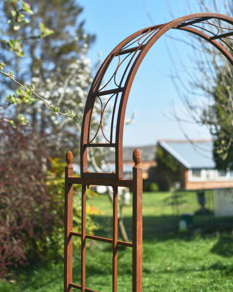 Close up of the side of the rustic rose arch