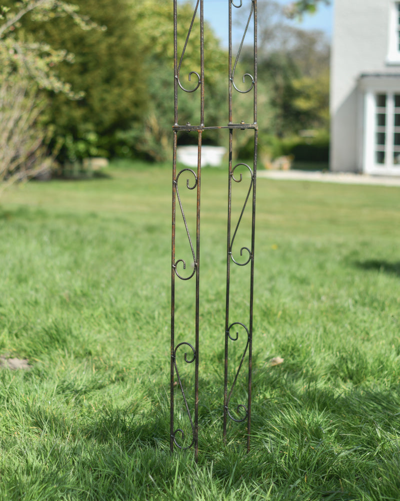 Close up of the base of the lacquered garden rose arch 