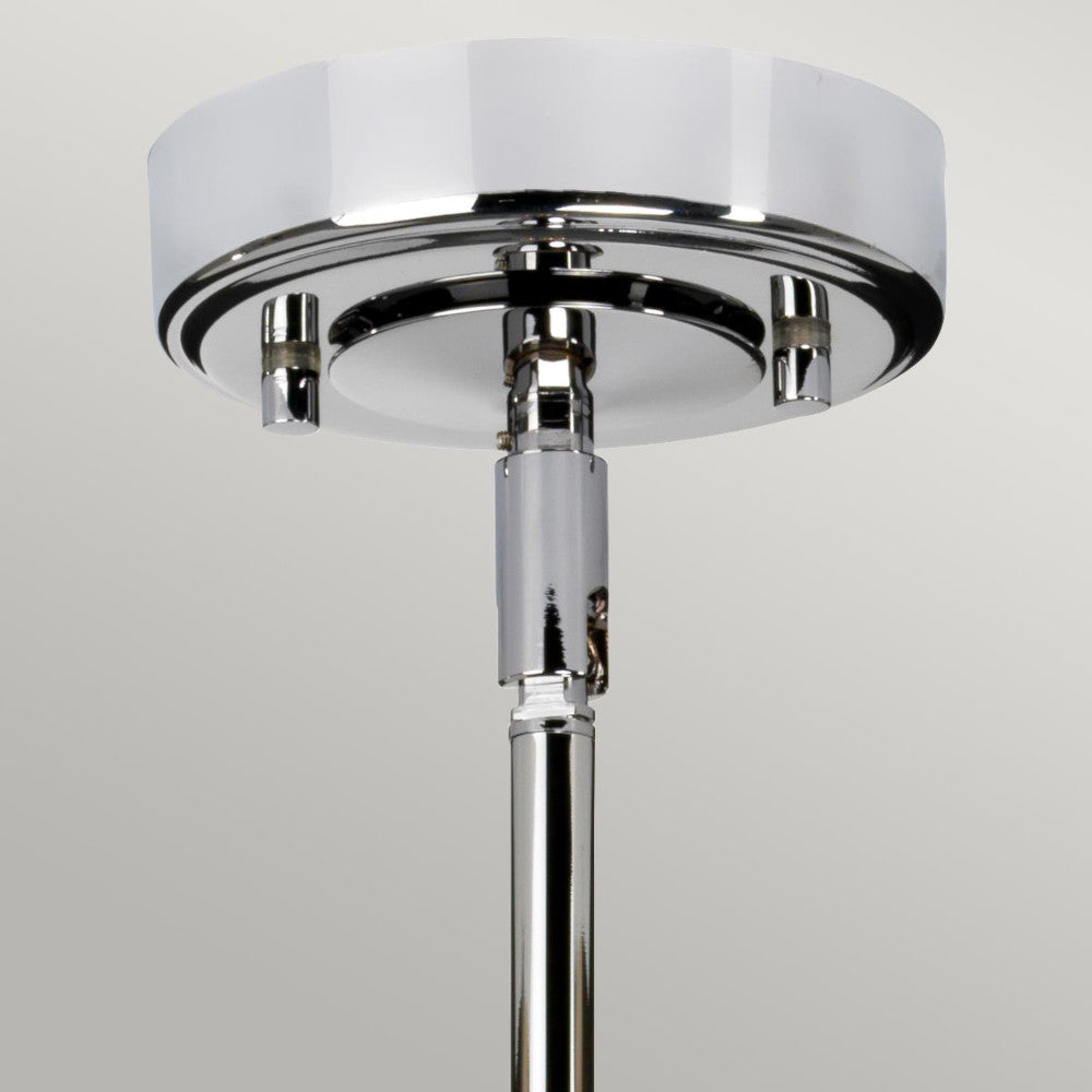 Close up of the polished chrome ceiling rose