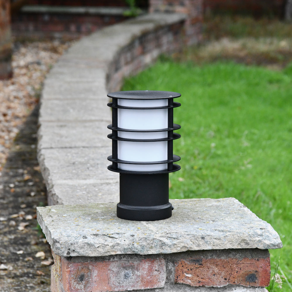 The compact wall light on a stone wall