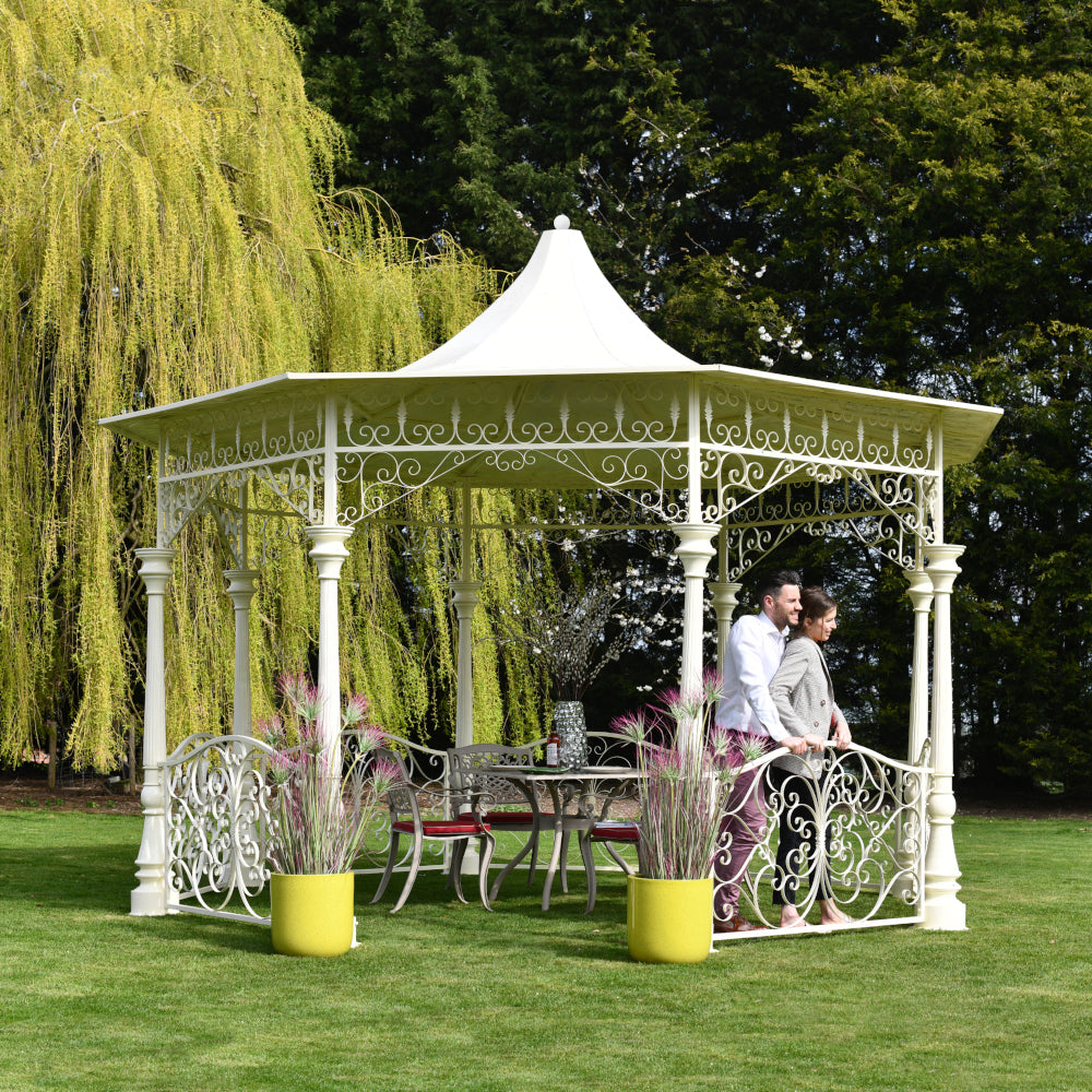 A couple in the cream bandstand 