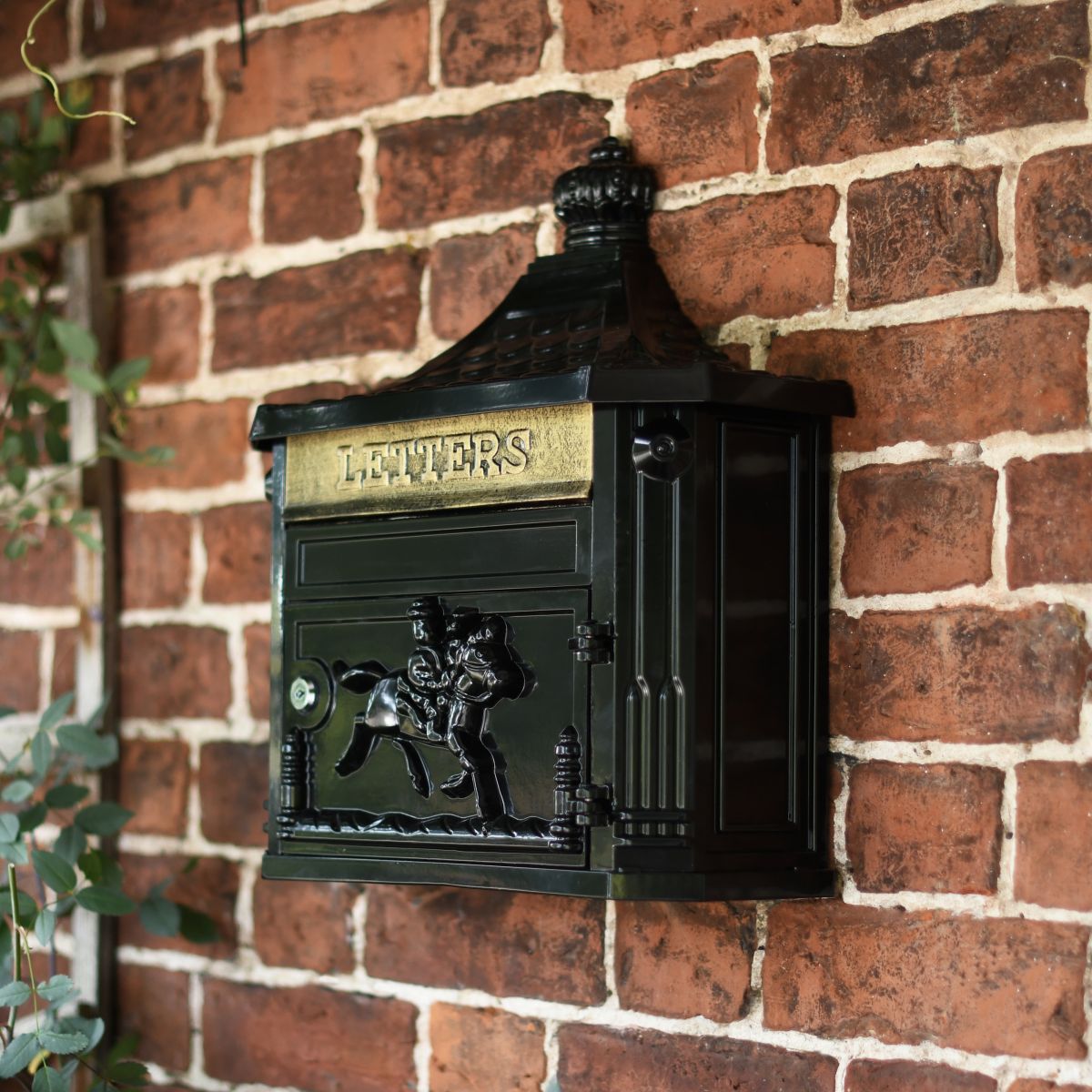 Three quarter angle of the racing horse black post box