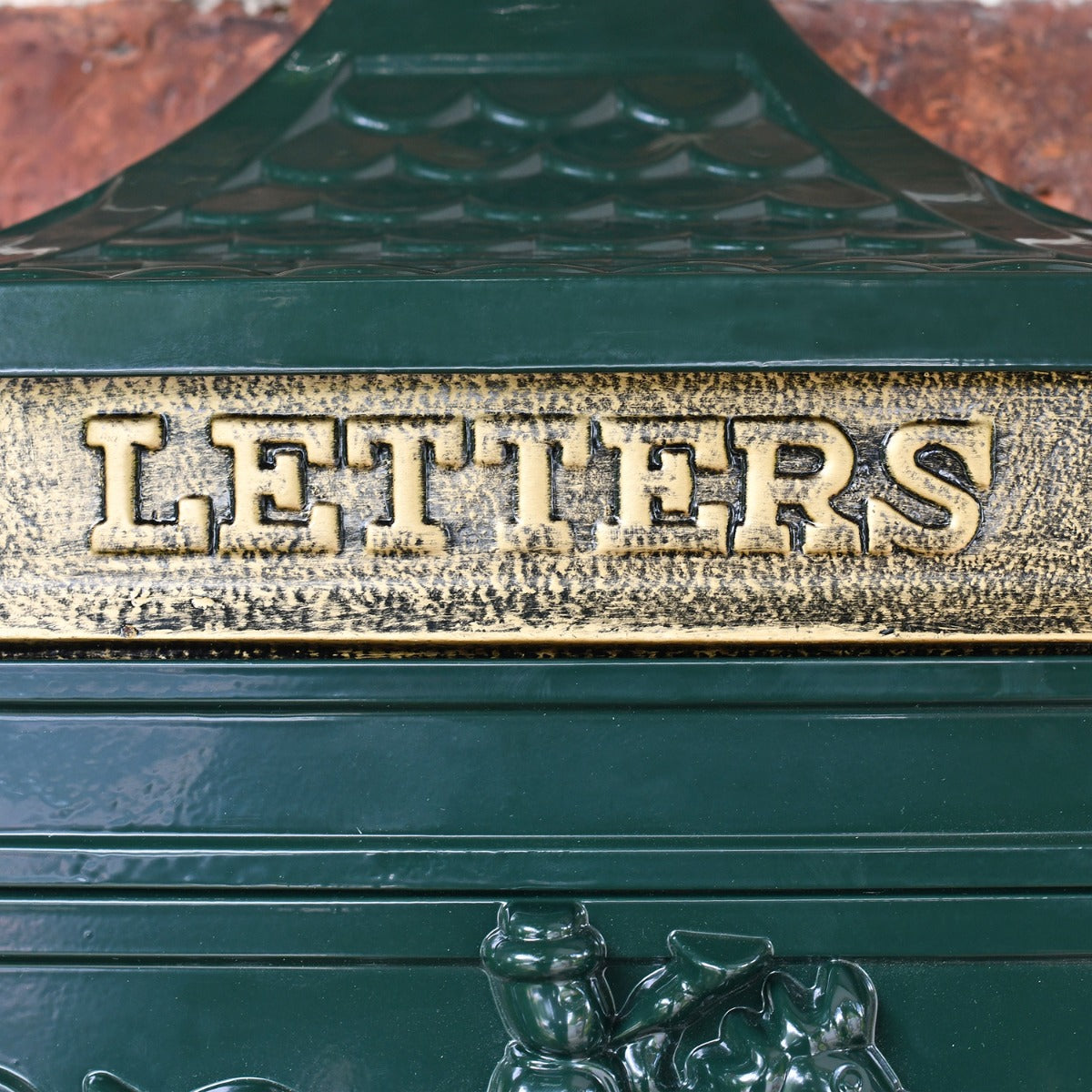 Brass Letter Flap on the Front of the "Huntley" Dark Green Wall Mounted Post Box