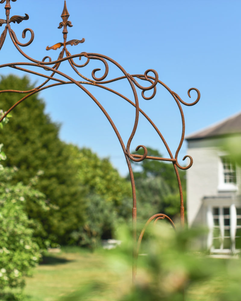 Angled view of the rustic rose arch apex