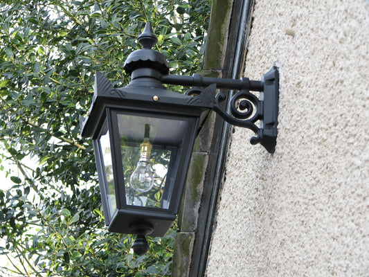Black Top Fix Garden Wall Lantern On Stone Wall