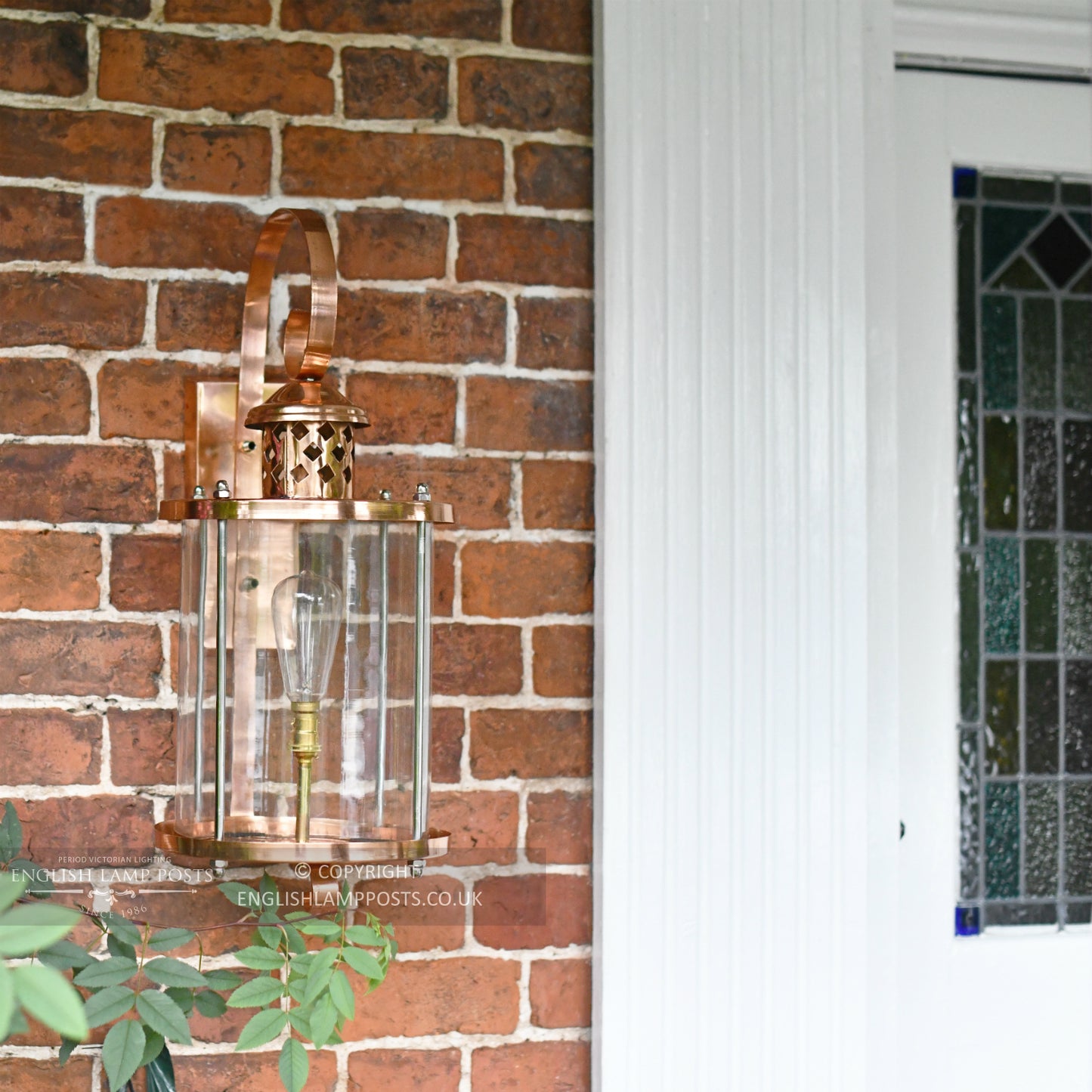 Large Copper Top Fix Cylindrical Wall Light Installed On Front Porch