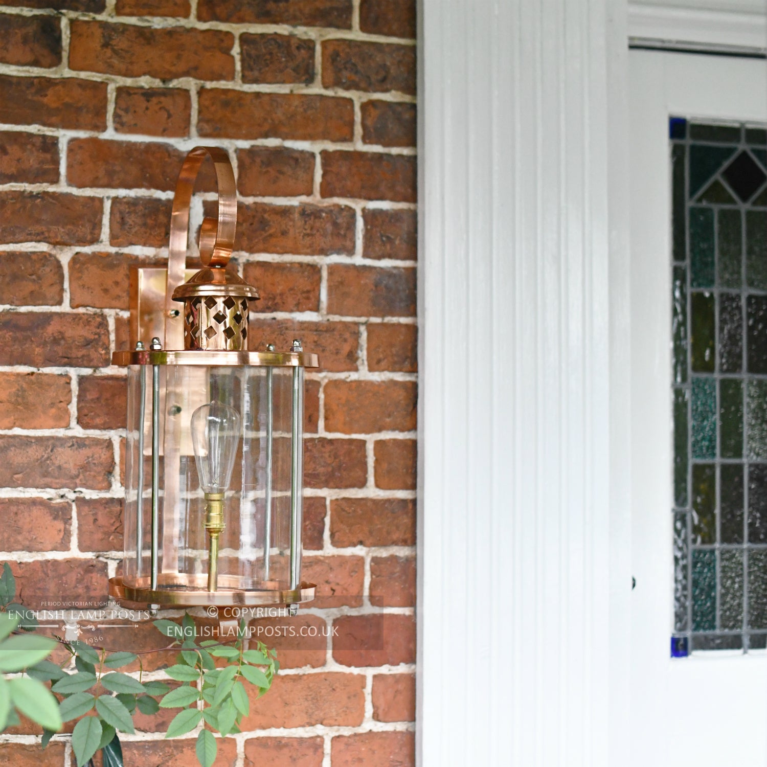 Large Copper Top Fix Cylindrical Wall Light Installed On Front Porch