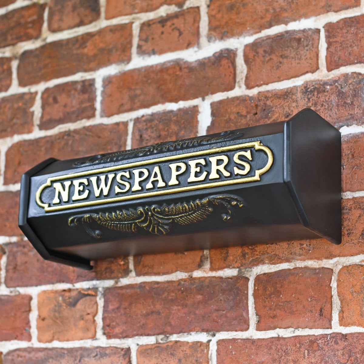 The Elizabeth Newspaper Holder mounted on wall 