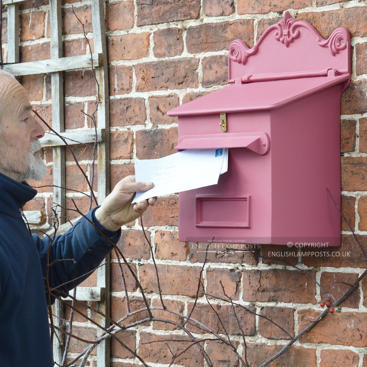 Pink Cambourne Secure Parcel Box in Use