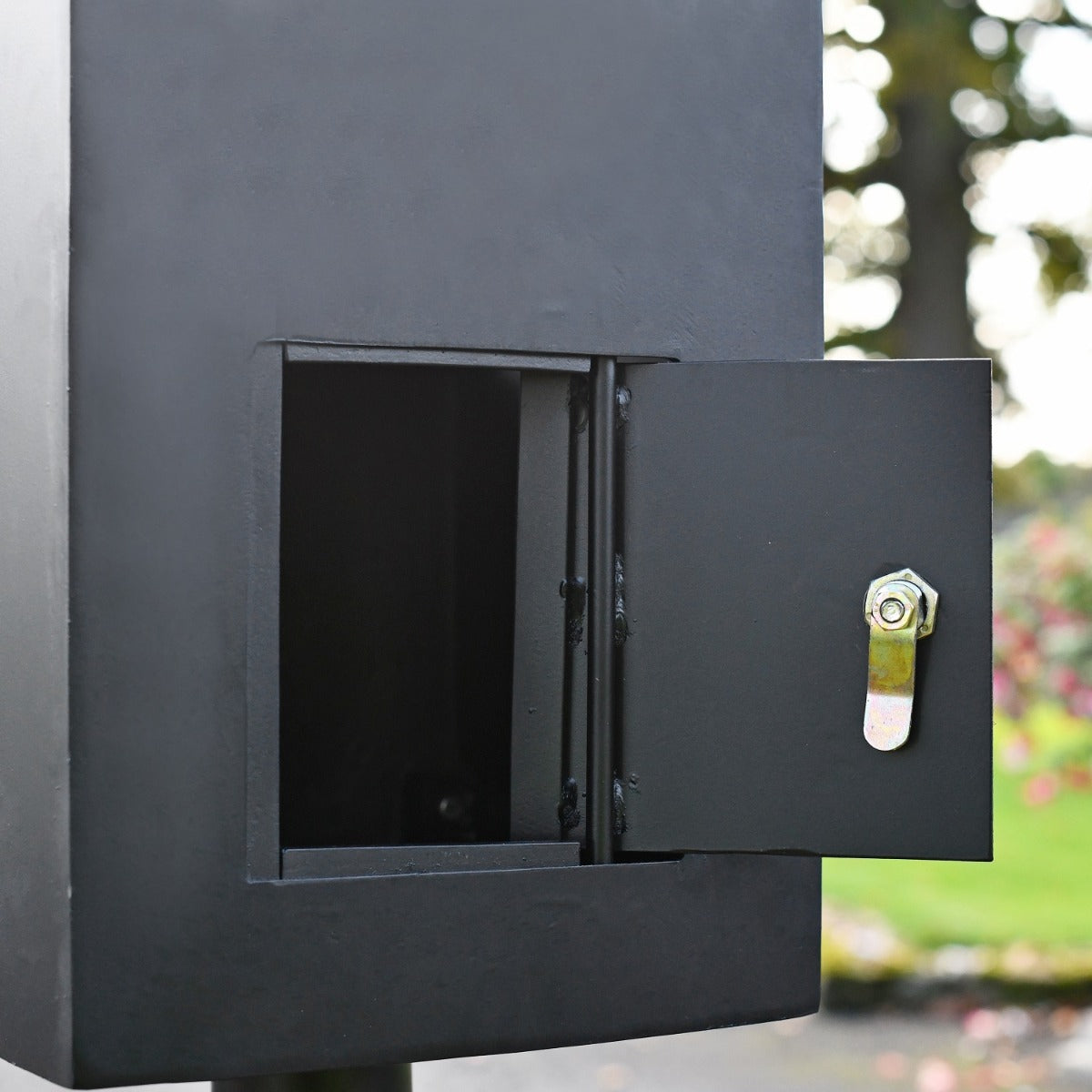 Close up of rear opening with lock latch 