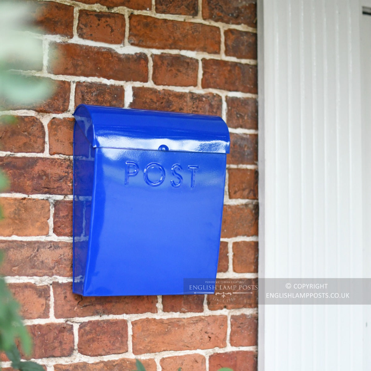 Angled view of the Sapphire Blue Contemporary Wall Mounted Post & Parcel Box