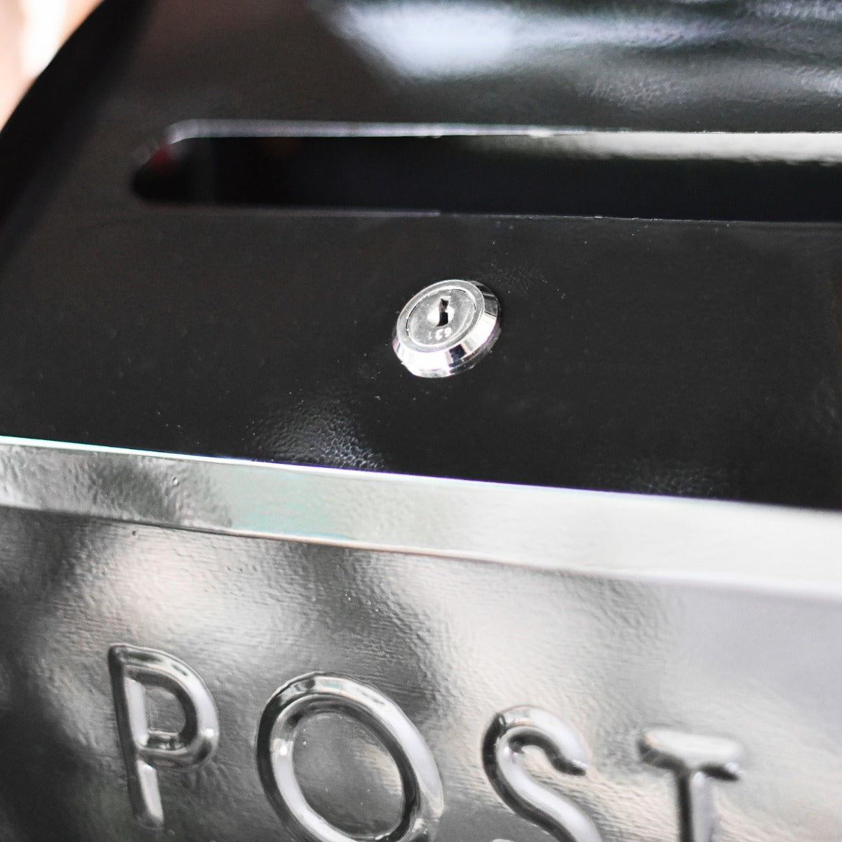 Close up of letter aperture and lock access 