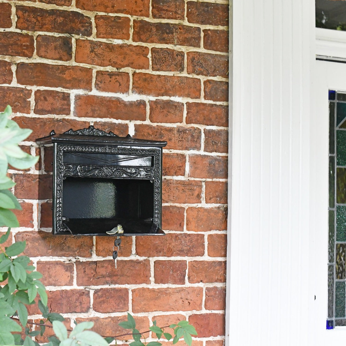 Black Ornate Victorian Wall Mounted Post Box in Situ 