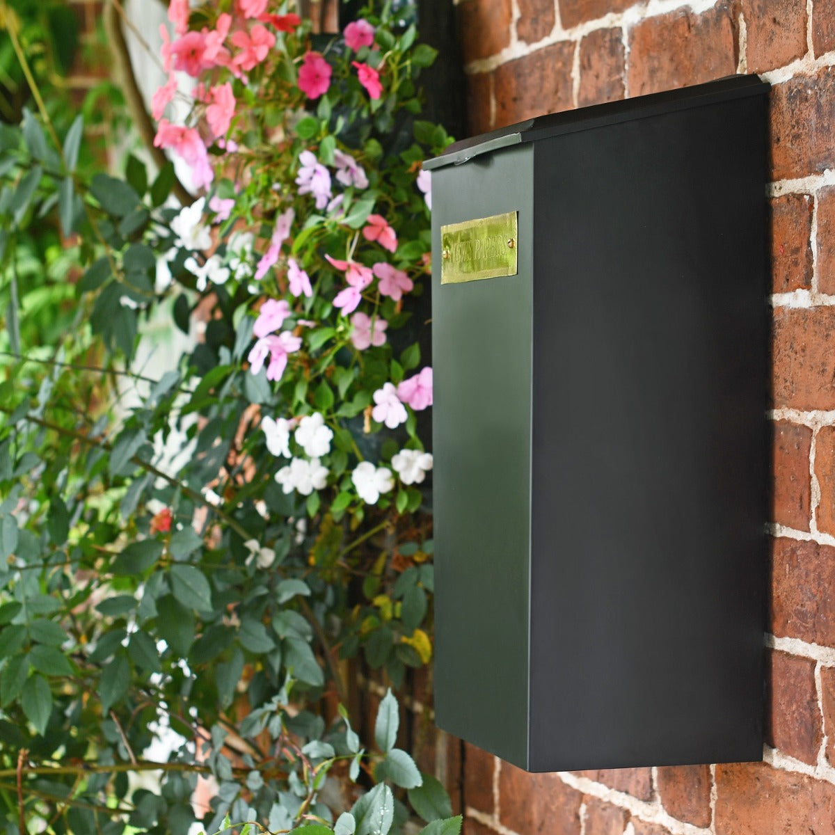 Side view of Extra Large 'Redhill' Black Newspaper Box with Brass Plaque on wall 