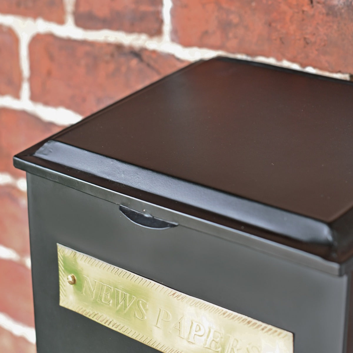 Close up of Black Newspaper Box Top 