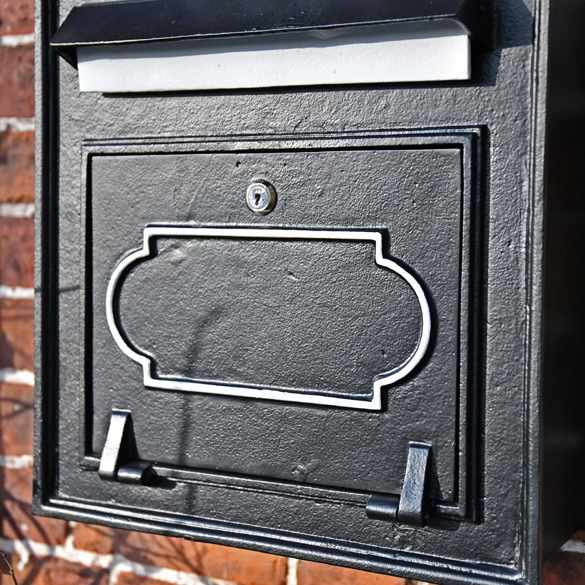 Close up of Black & White detailing on 'Alderton' Post Box 