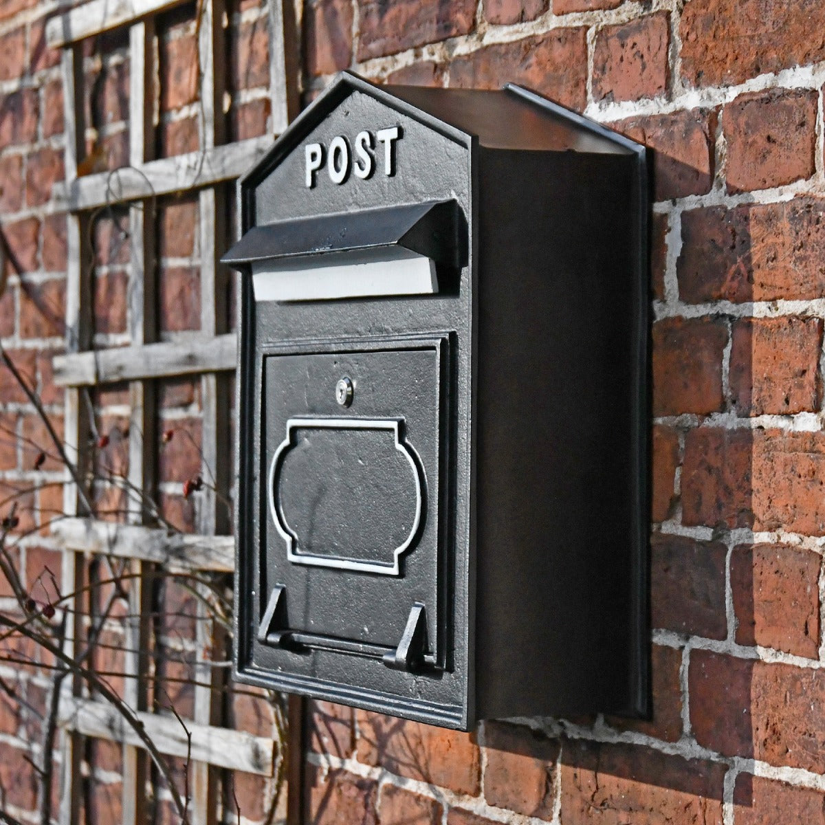 Side view of Cast Iron Black & White 'Alderton' Post Box 