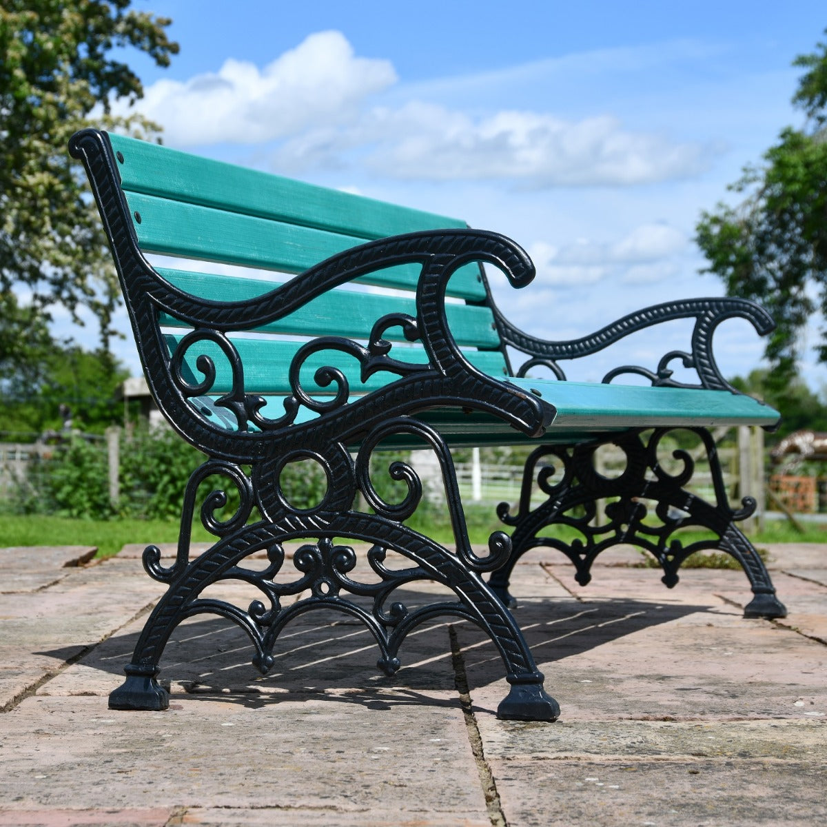 Ornate Scroll Cast Iron and Green Park Bench