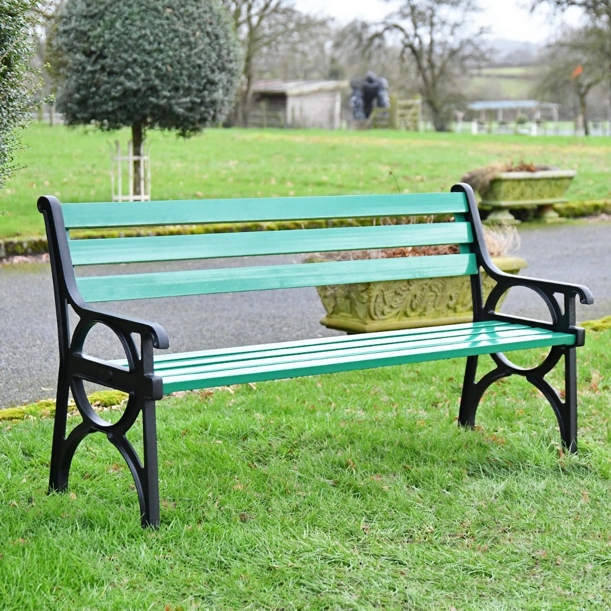 Simplistic Cast Iron and Green Park Bench