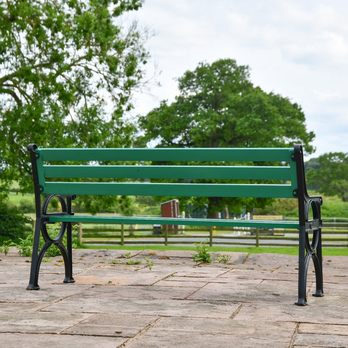 Simplistic Cast Iron and Green Park Bench