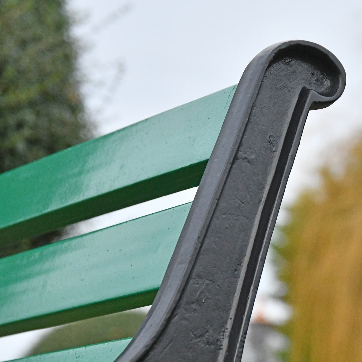 Simplistic Cast Iron and Green Park Bench
