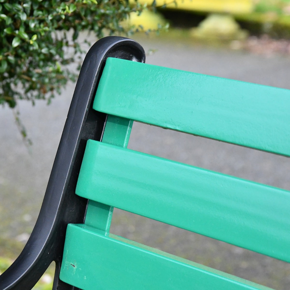 Simplistic Cast Iron and Green Park Bench