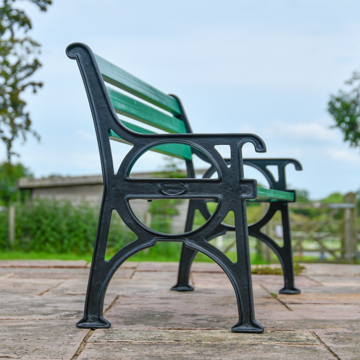 Simplistic Cast Iron and Green Park Bench