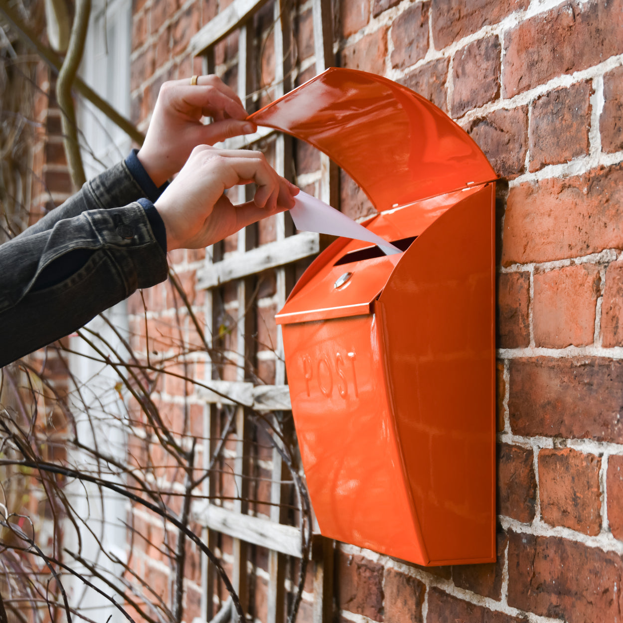 Life size scale of the lockable ornage post box